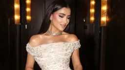 مي عمر تتألق بفستان أبيض...